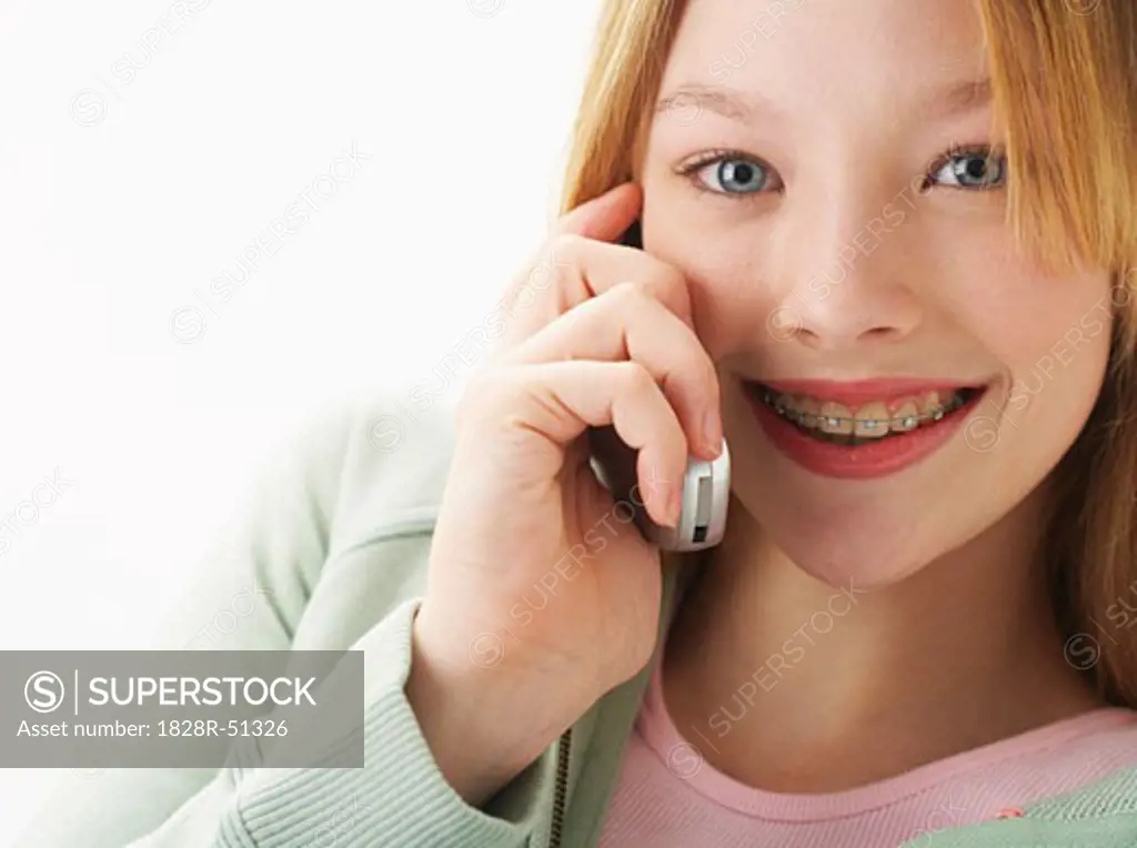 Girl Using Cellular Phone   