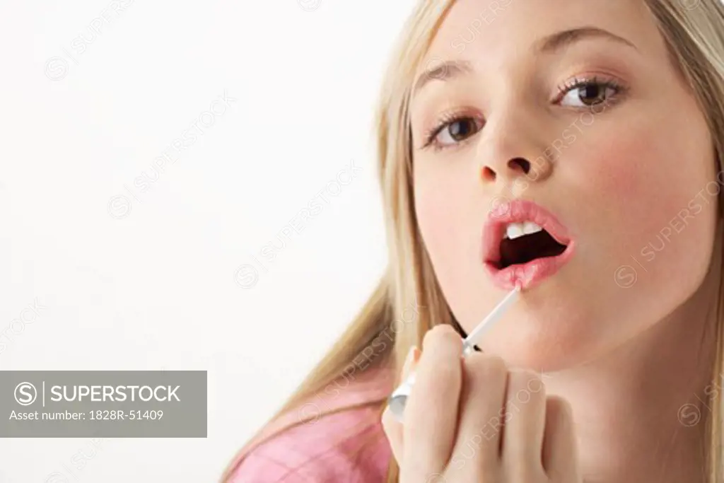 Girl Applying Make-Up   