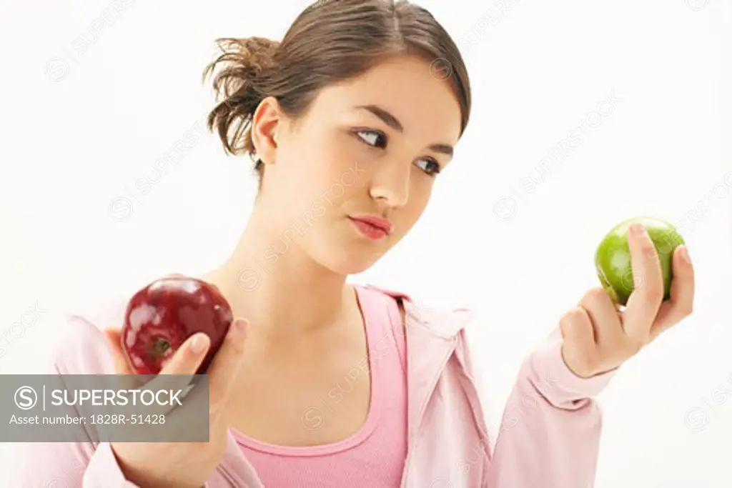 Girl Holding Apples   