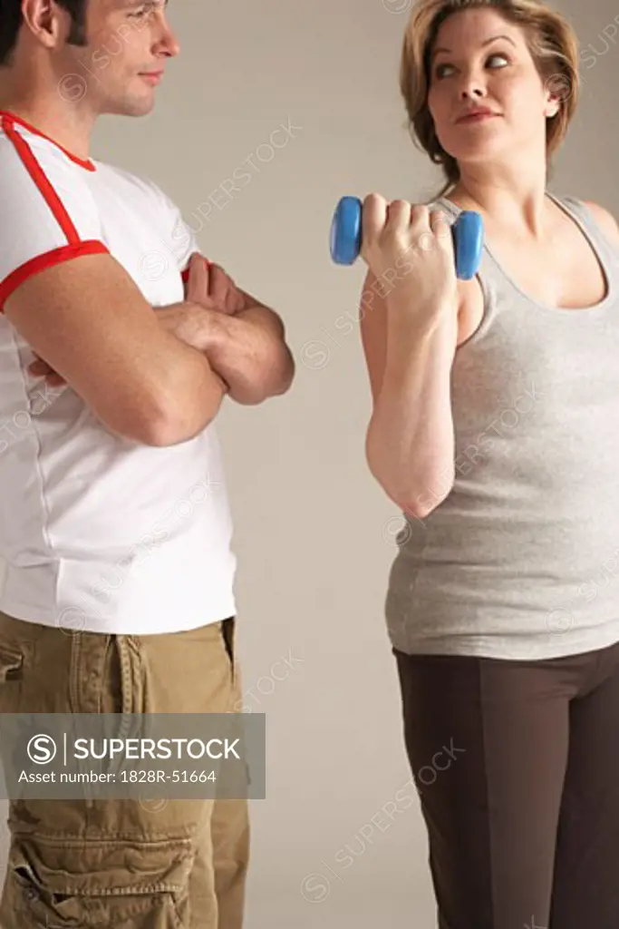 Woman With Personal Trainer   