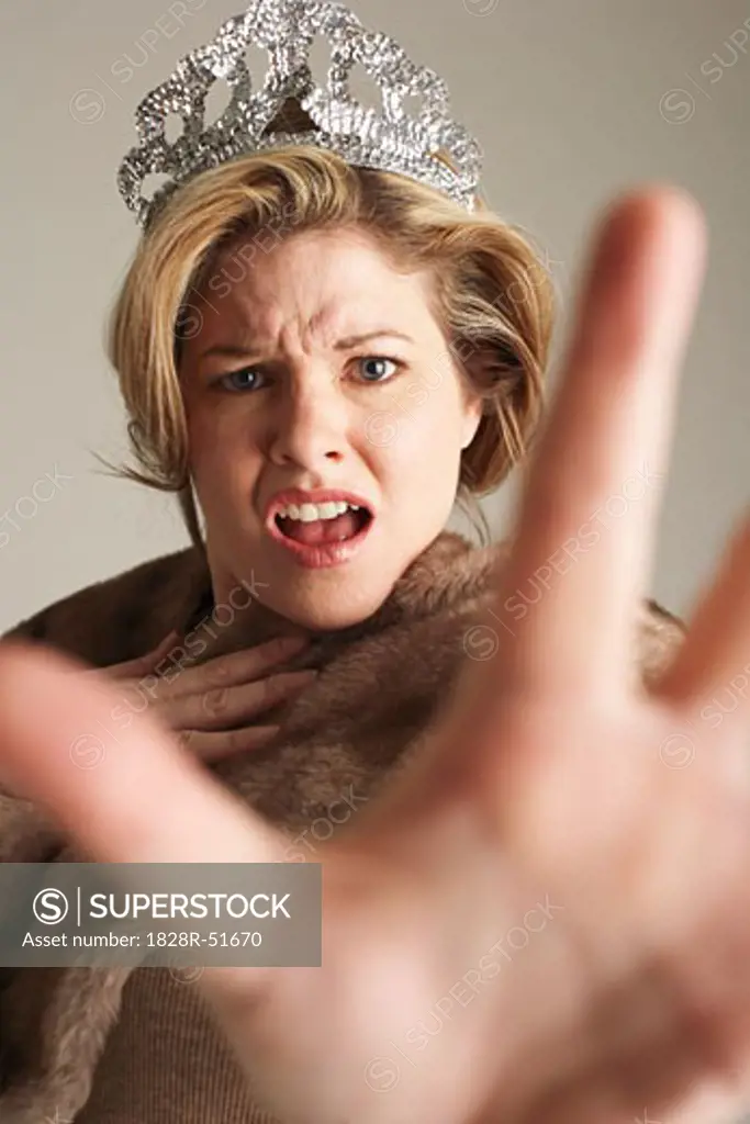 Woman Wearing Tiara, Looking Angry   