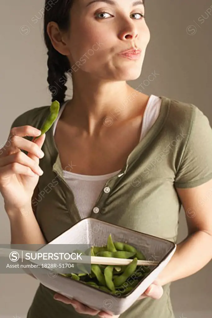 Woman Eating Peas   