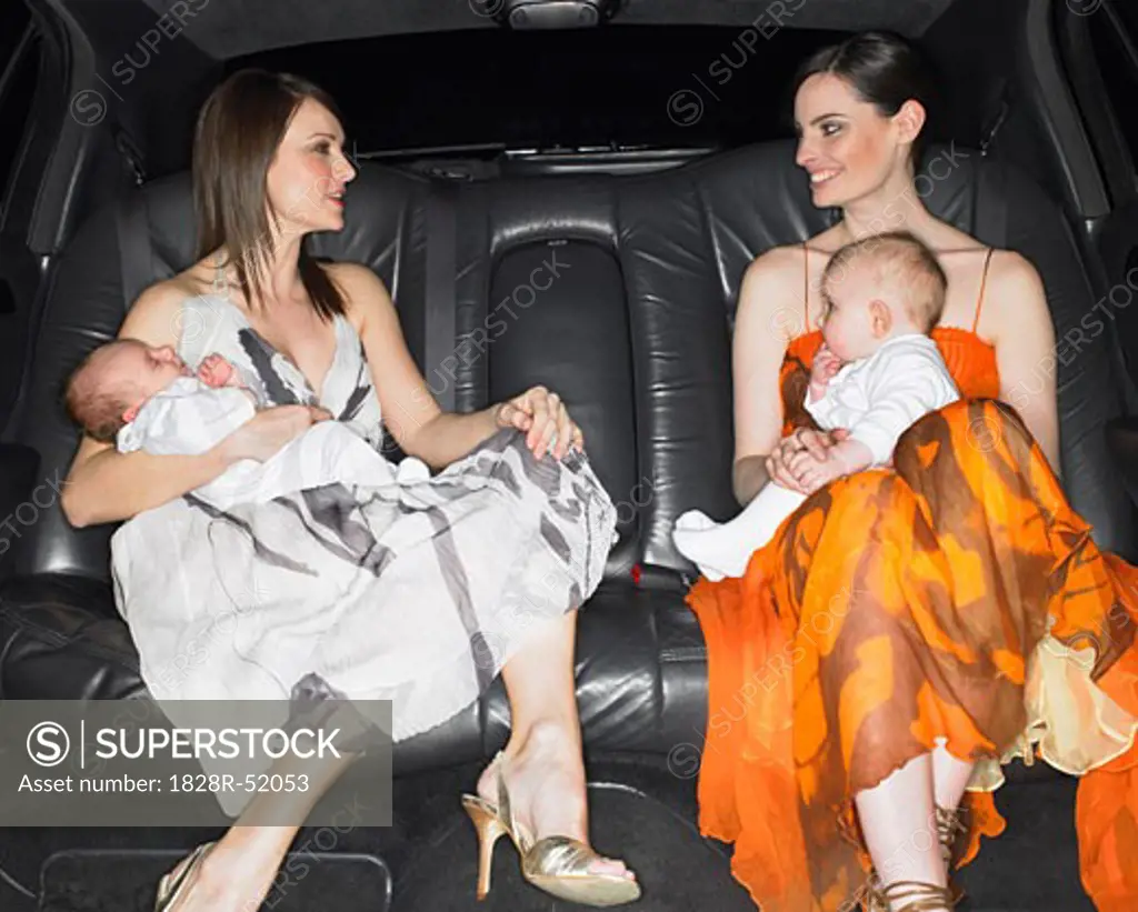 Two Mothers With Babies In A Limo   