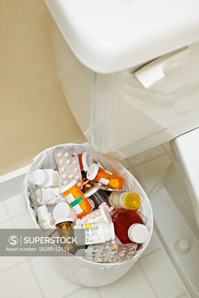 Pill Bottles in Garbage Can   