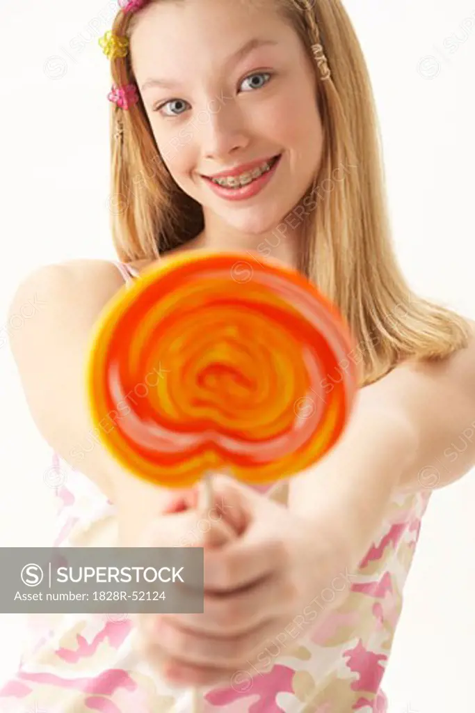 Girl Holding Lollipop   