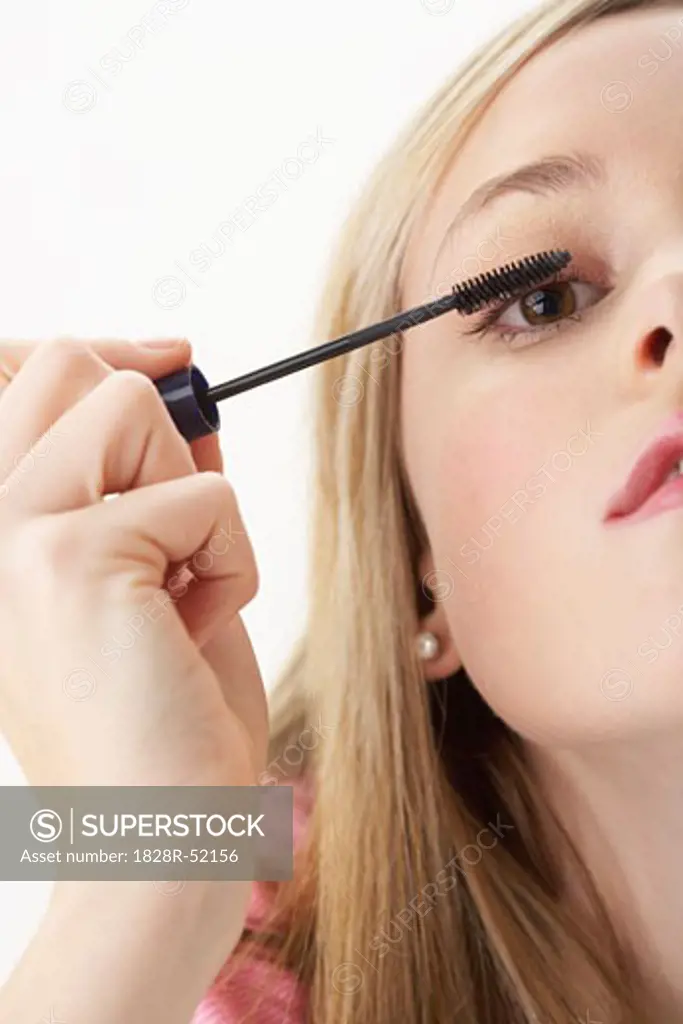 Girl Applying Mascara   