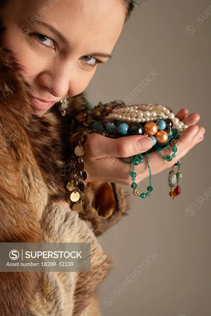Woman Holding Jewelry   