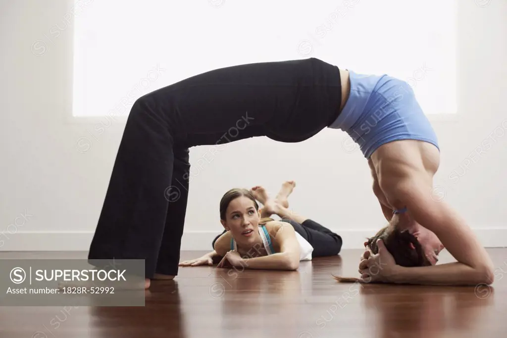 Woman Watching Woman Stretch   