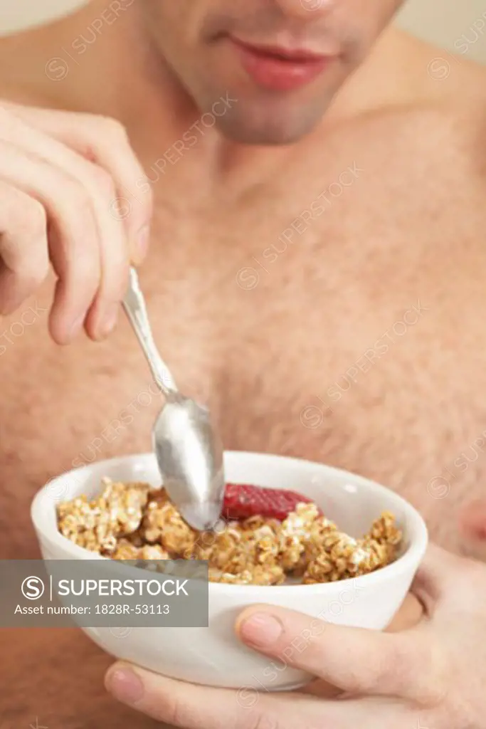 Man Eating Cereal   