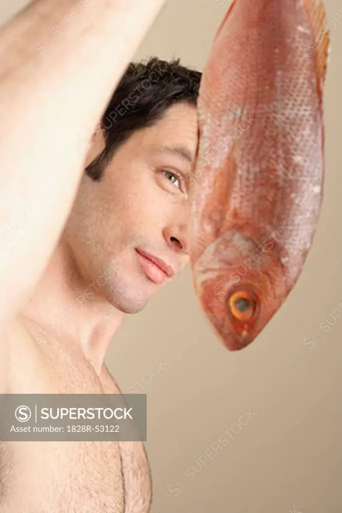 Man Holding Fish   