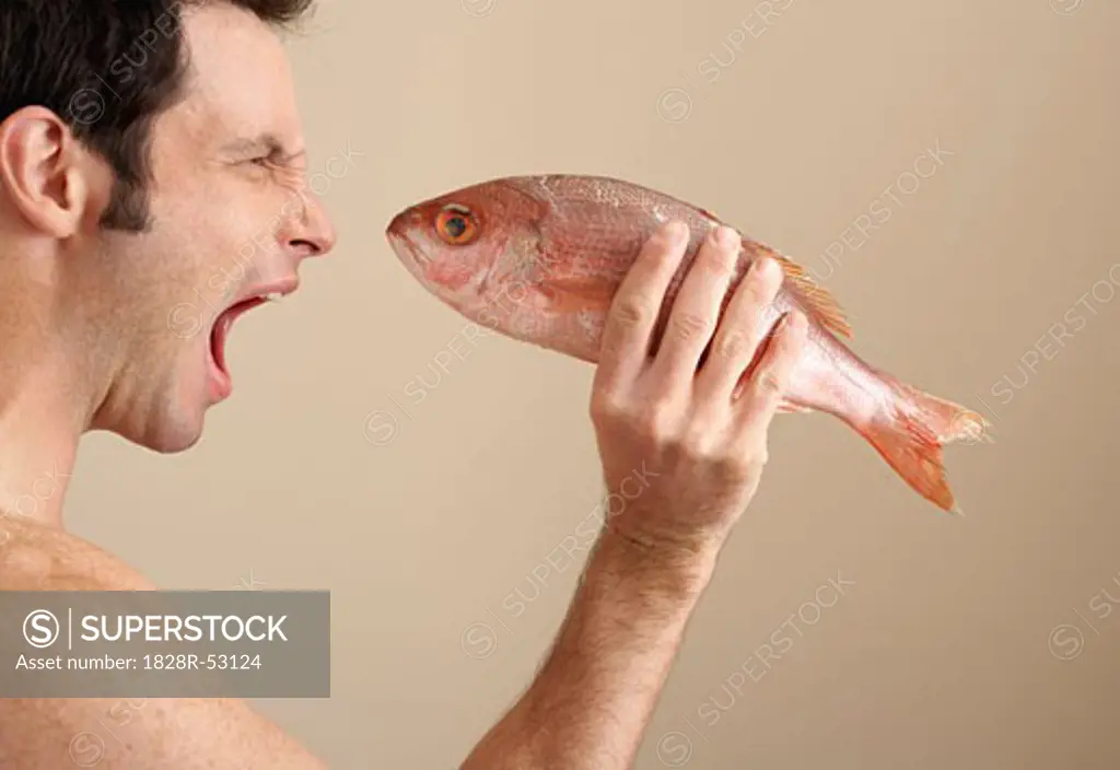 Man Holding Fish   