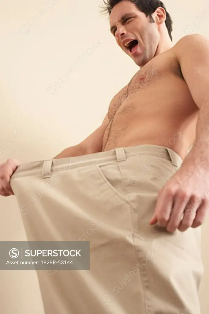 Man Wearing Oversized Pants   