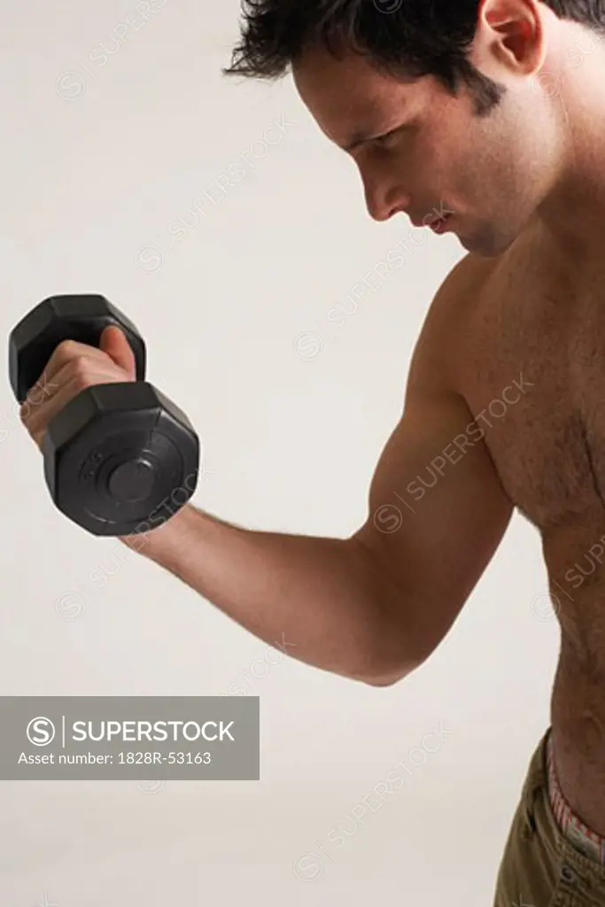 Man Lifting Weights   