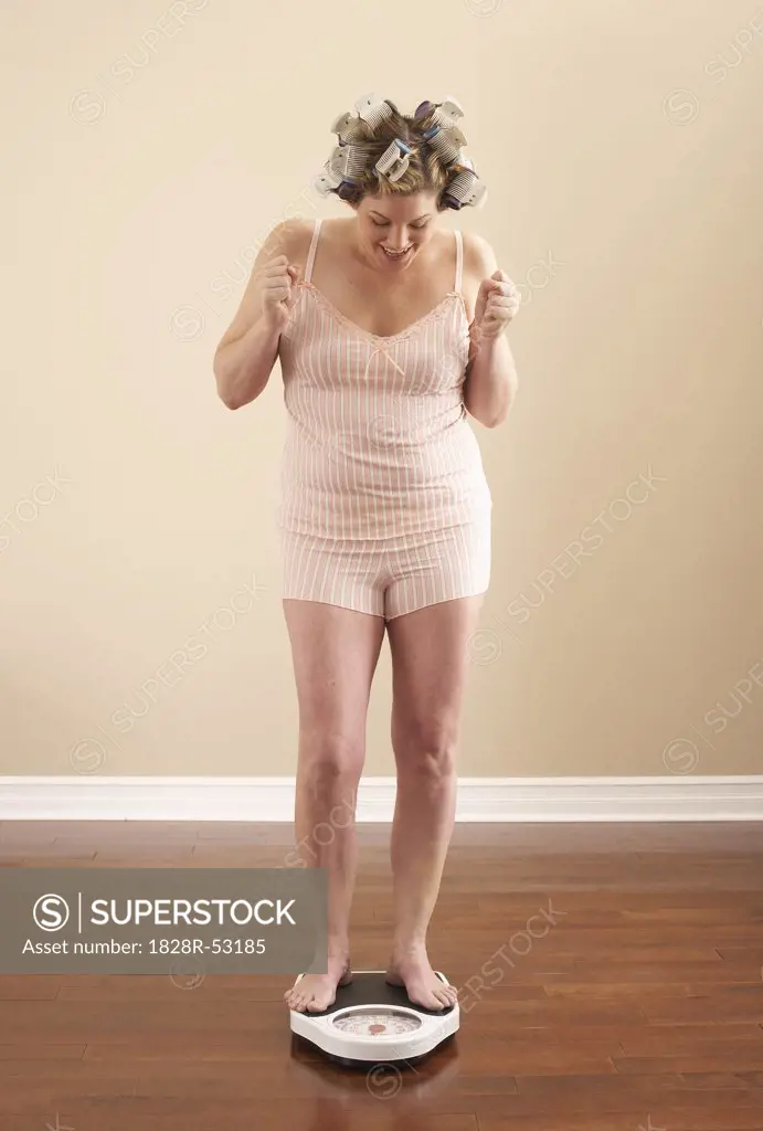 Woman Weighing Self   