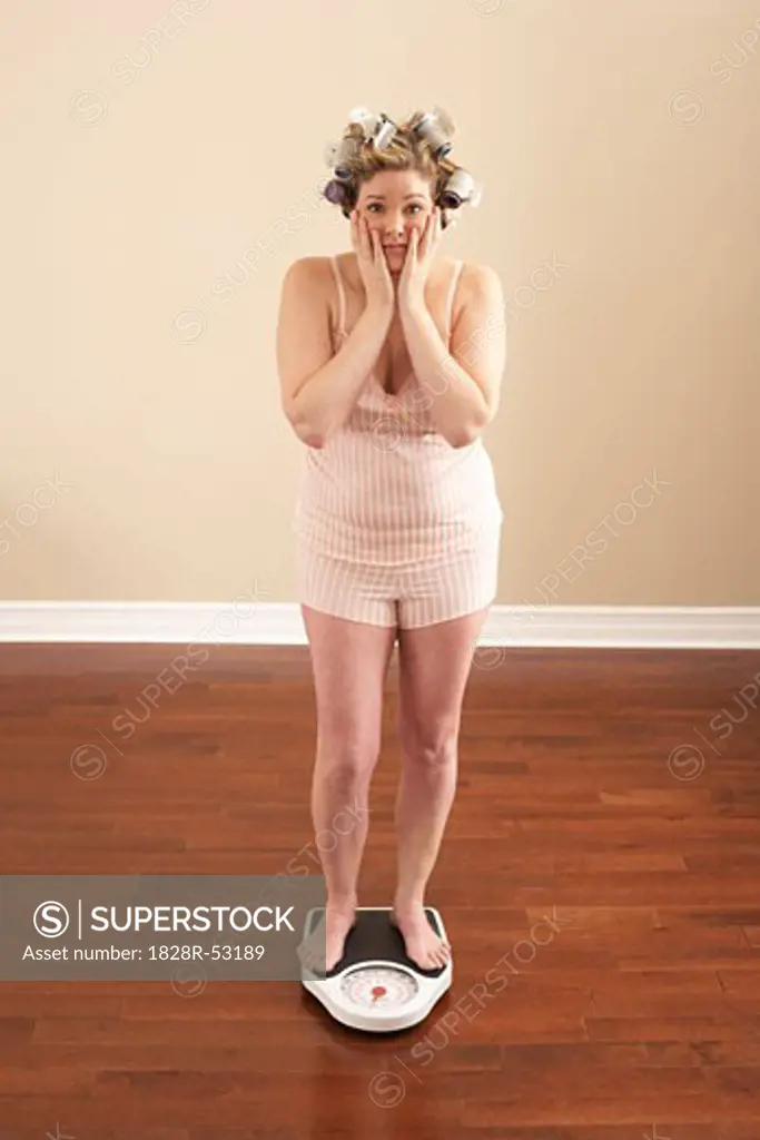 Woman Weighing Self   