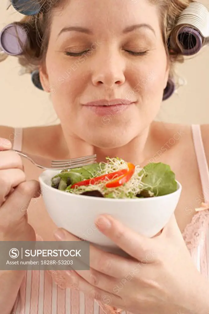 Woman Eating Salad   