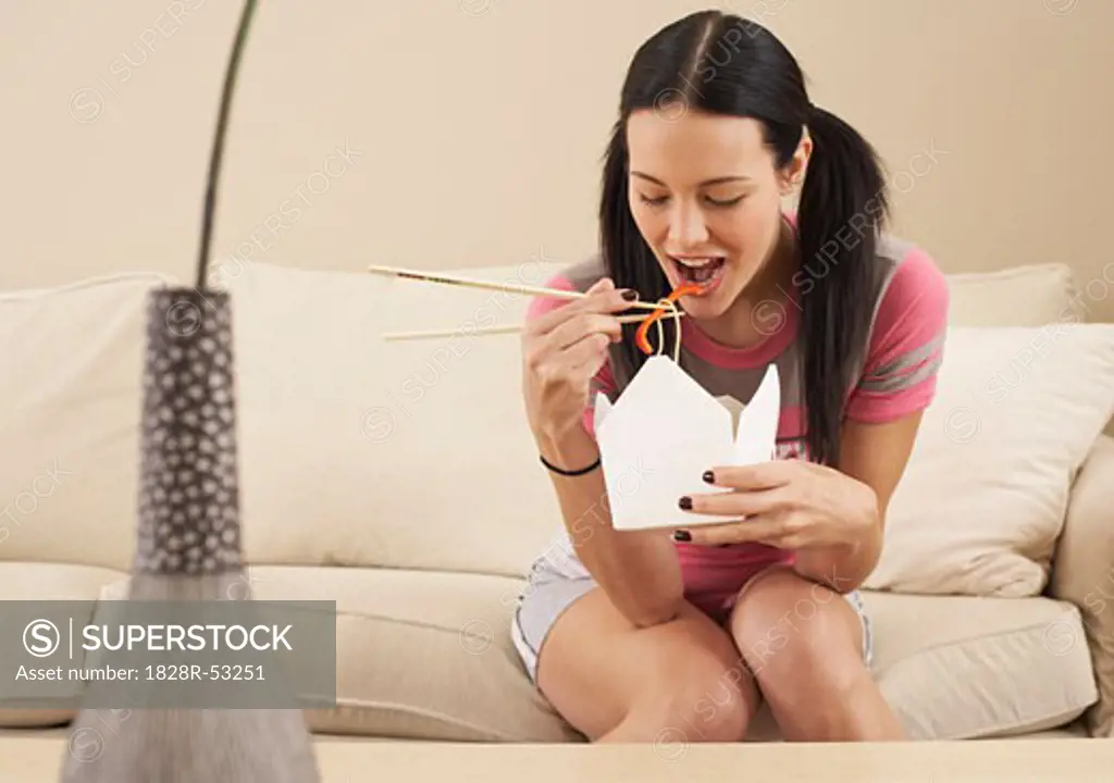 Woman Eating Chinese Food   