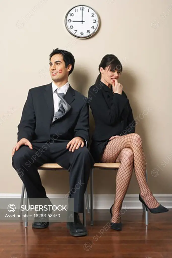 Woman and Man Flirting in Waiting Area   