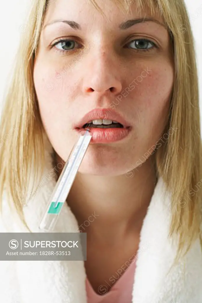 Woman with Thermometer in Mouth   