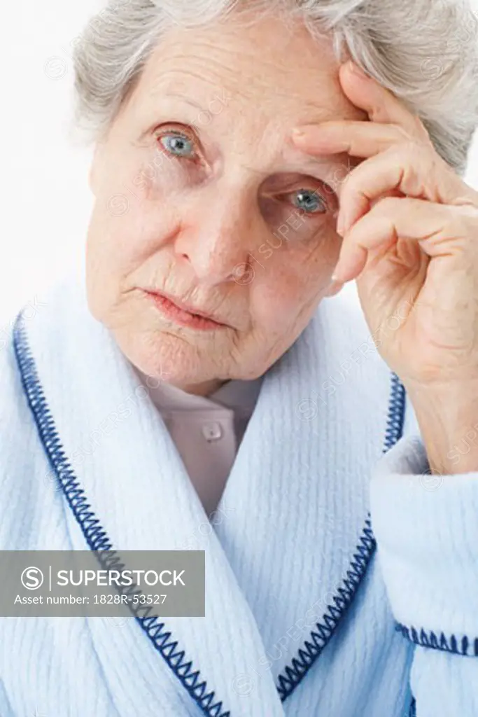 Portrait of Elderly Woman with Headache   