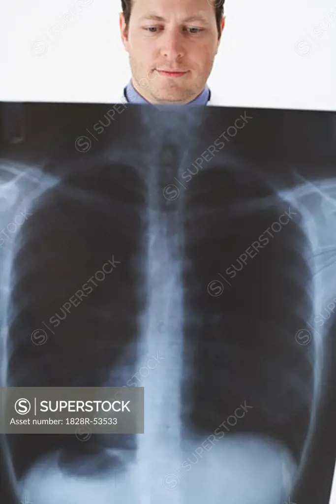Doctor Looking at Chest X-Ray   