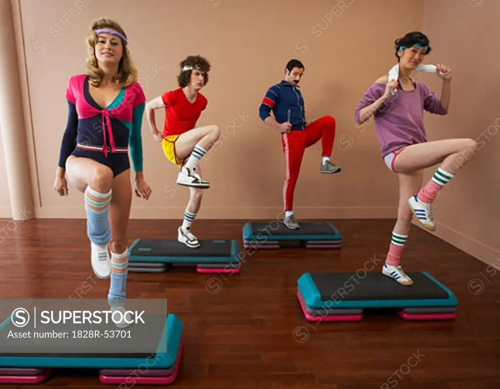 People in 1970's Clothing Exercising   