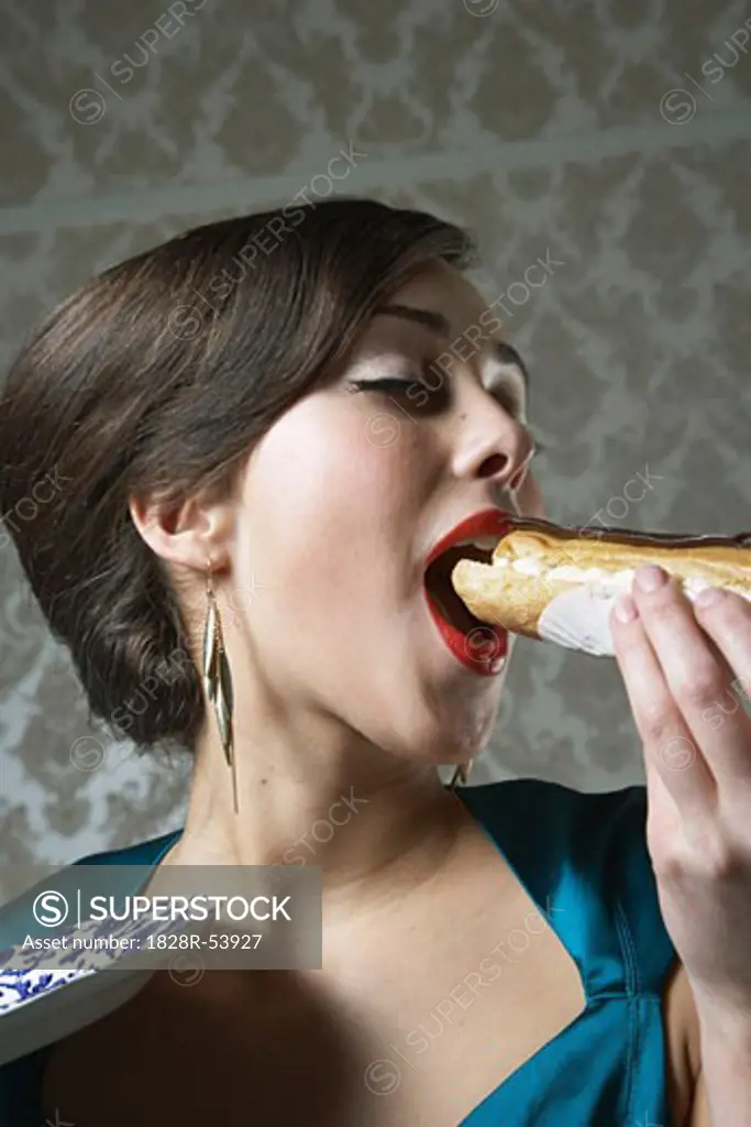 Woman Eating Eclair   