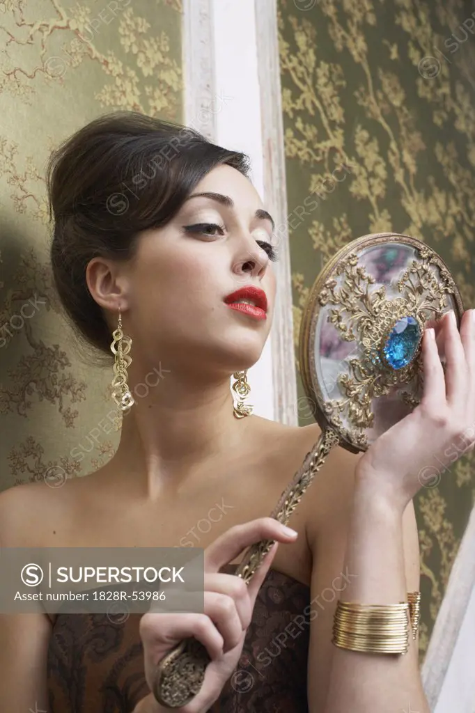 Portrait of Woman Holding Mirror   