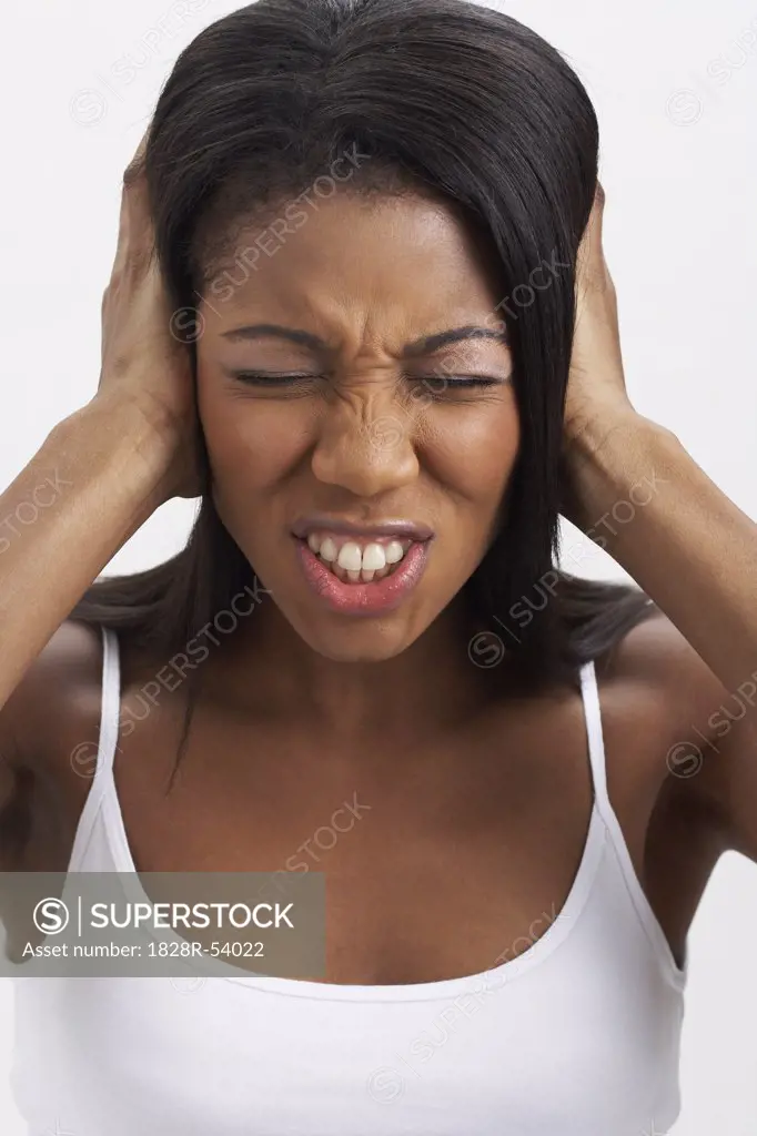 Woman Covering Ears   
