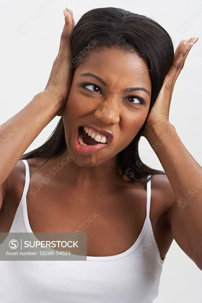 Woman Covering Ears   