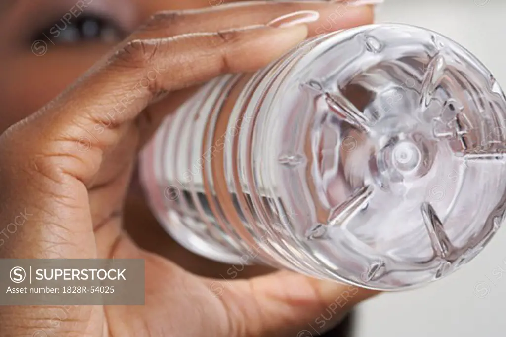 Woman Drinking Bottled Water   