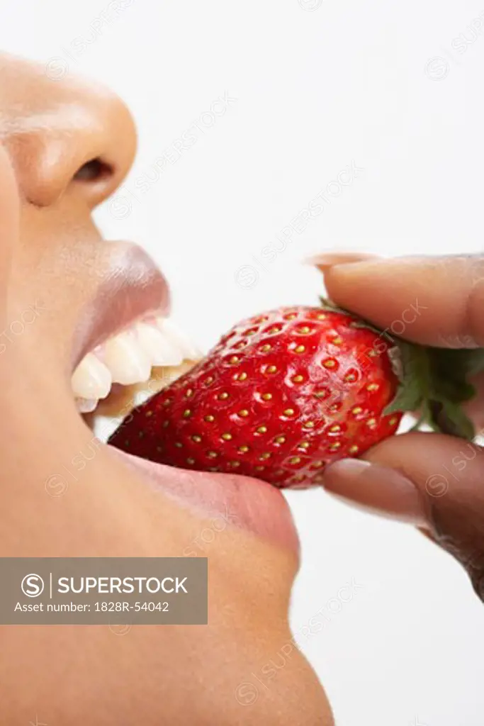 Woman Eating Strawberry   