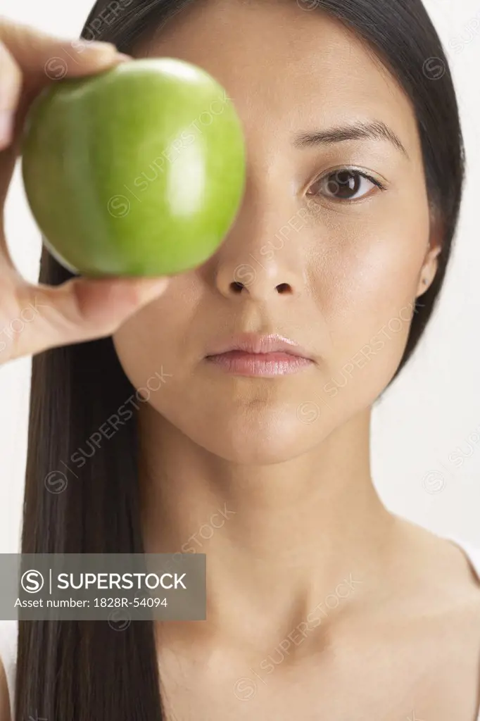 Woman Holding Apple   
