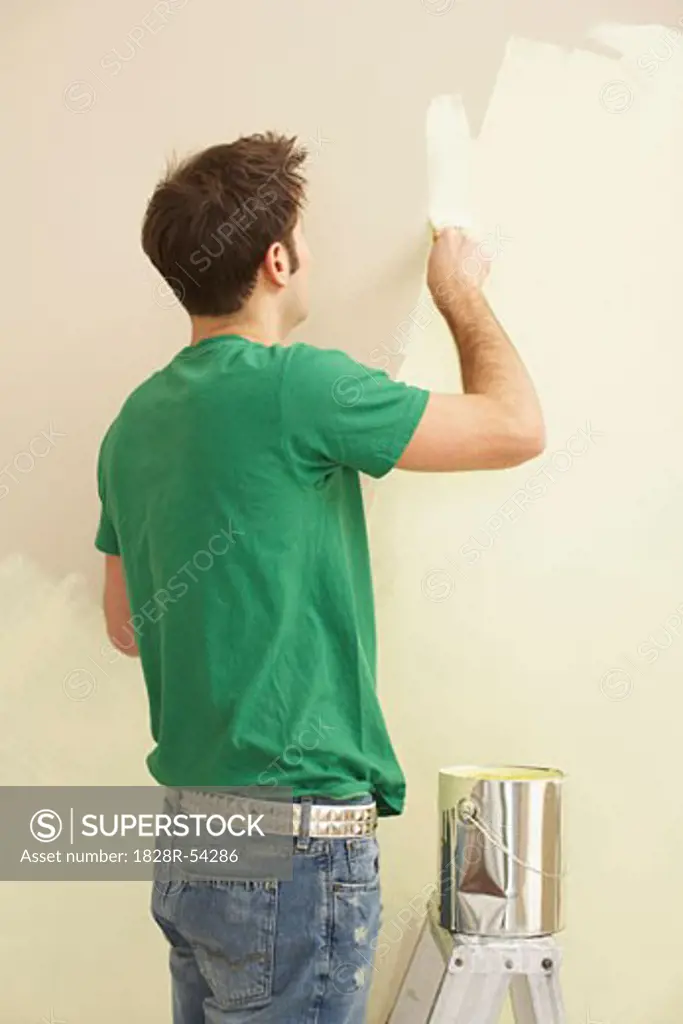 Man Painting Wall   
