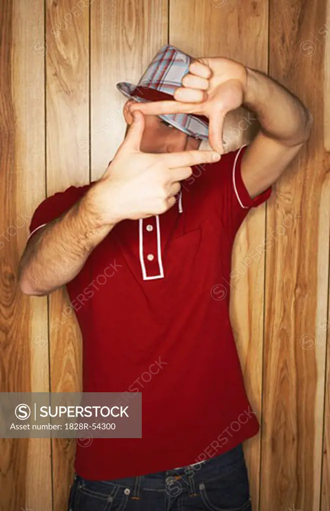 Man Making Frame Shape with Hands   