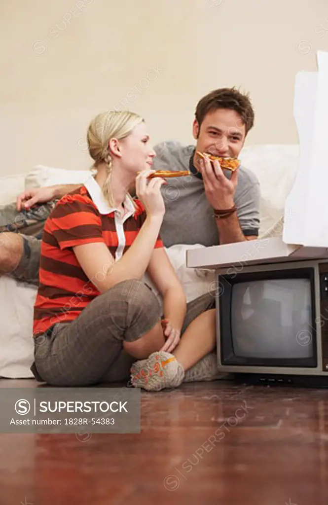 Couple Eating Pizza   