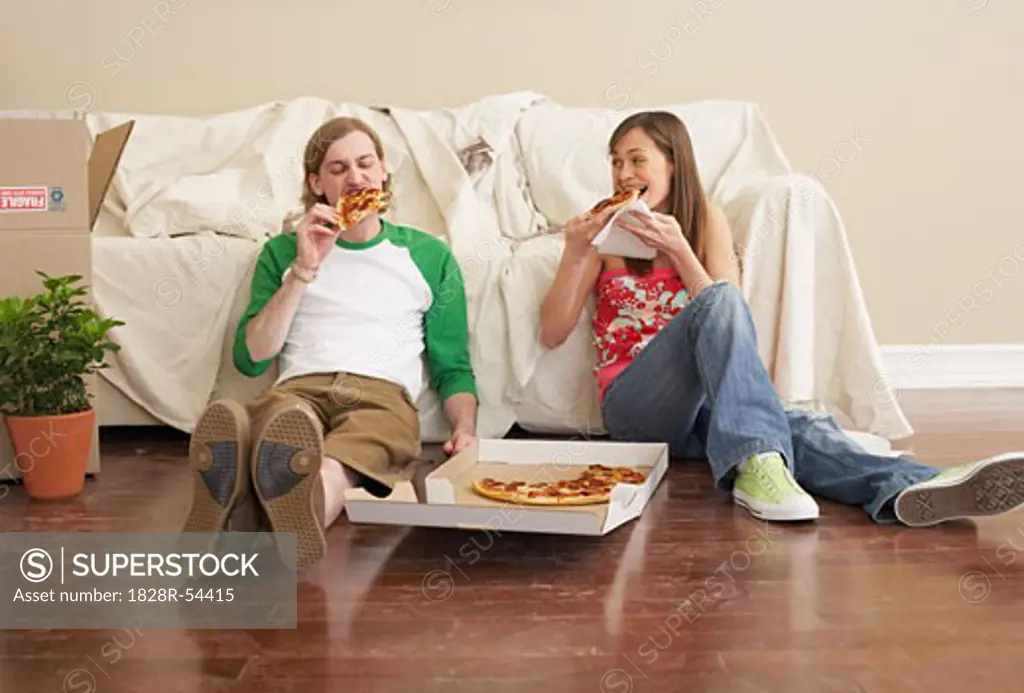 Couple Eating Pizza   