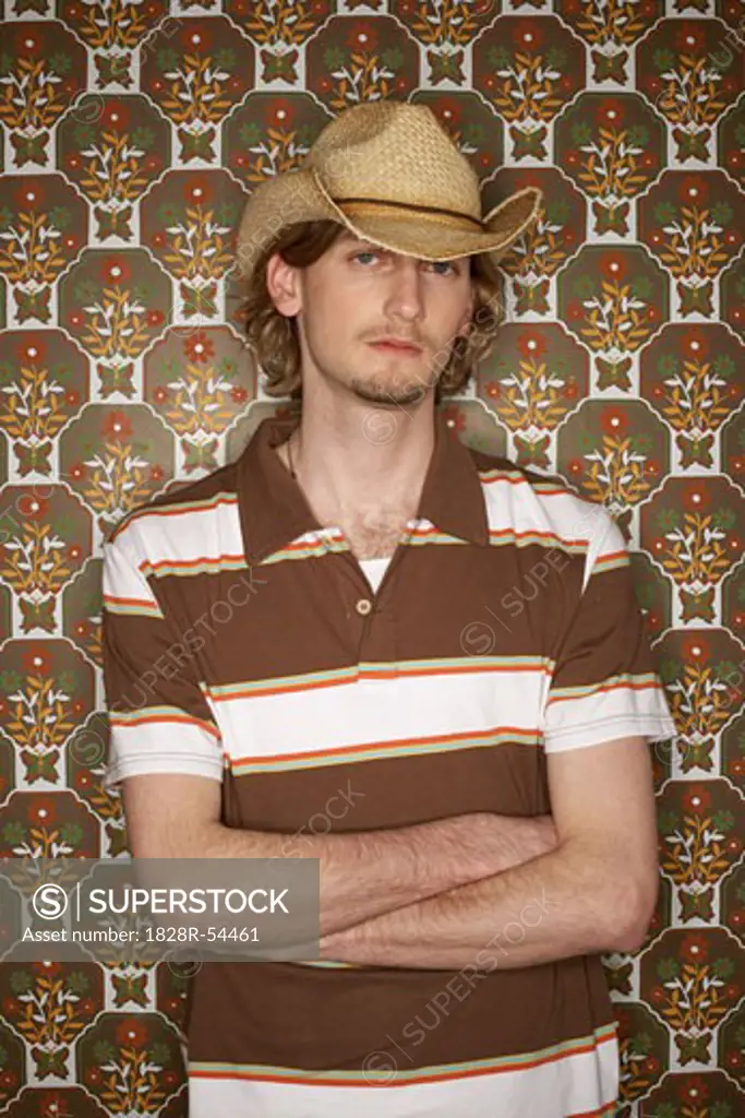 Young Man Wearing Cowboy Hat   