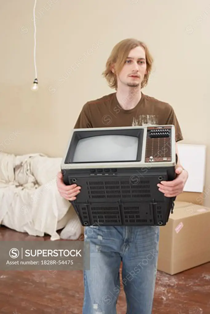 Man Carrying a Television   
