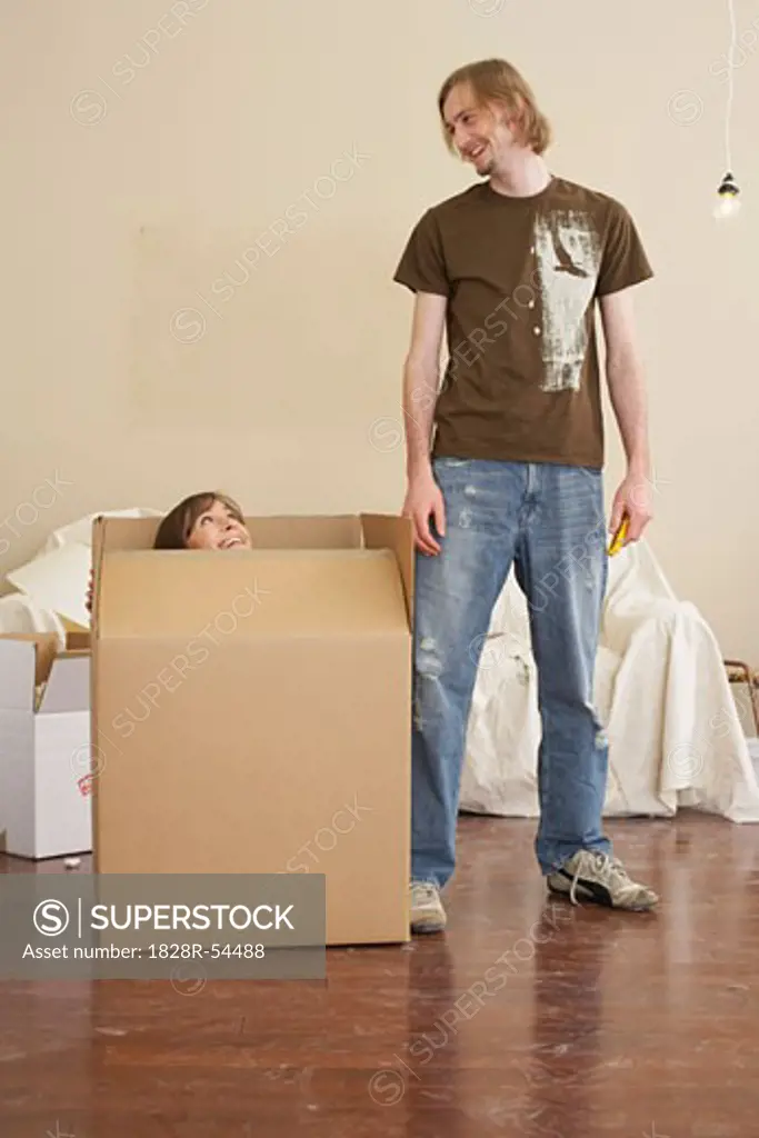 Couple Playing with Box   