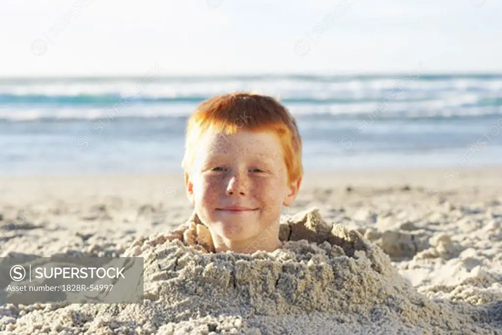 Boy Buried in Sand   