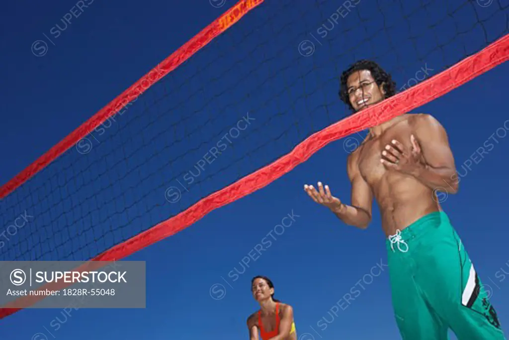 People Playing Beach Volleyball   