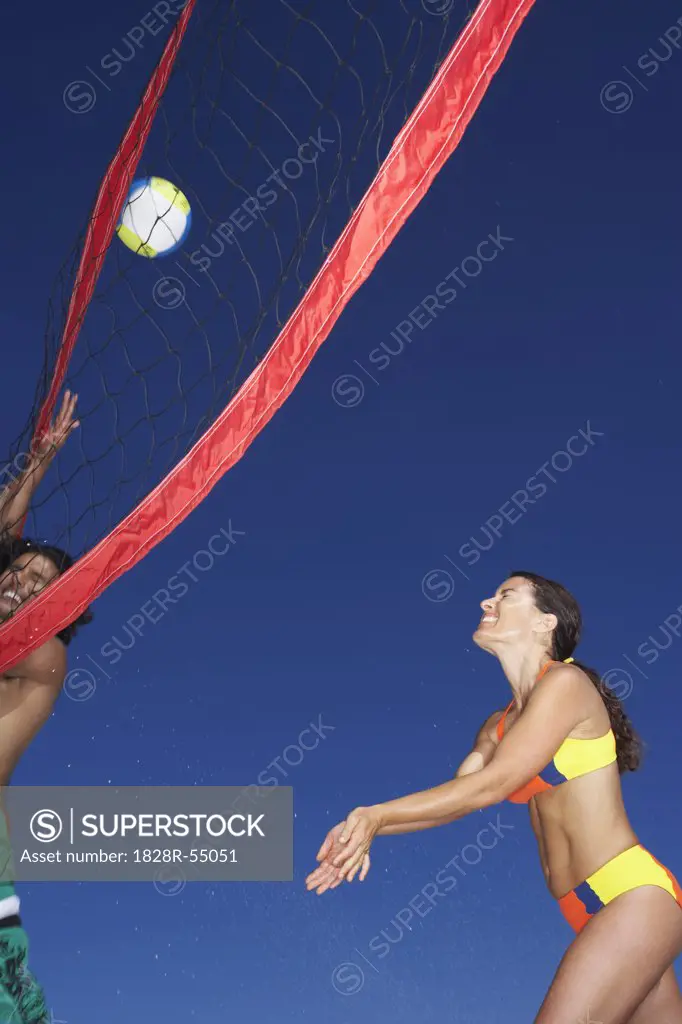 People Playing Beach Volleyball   