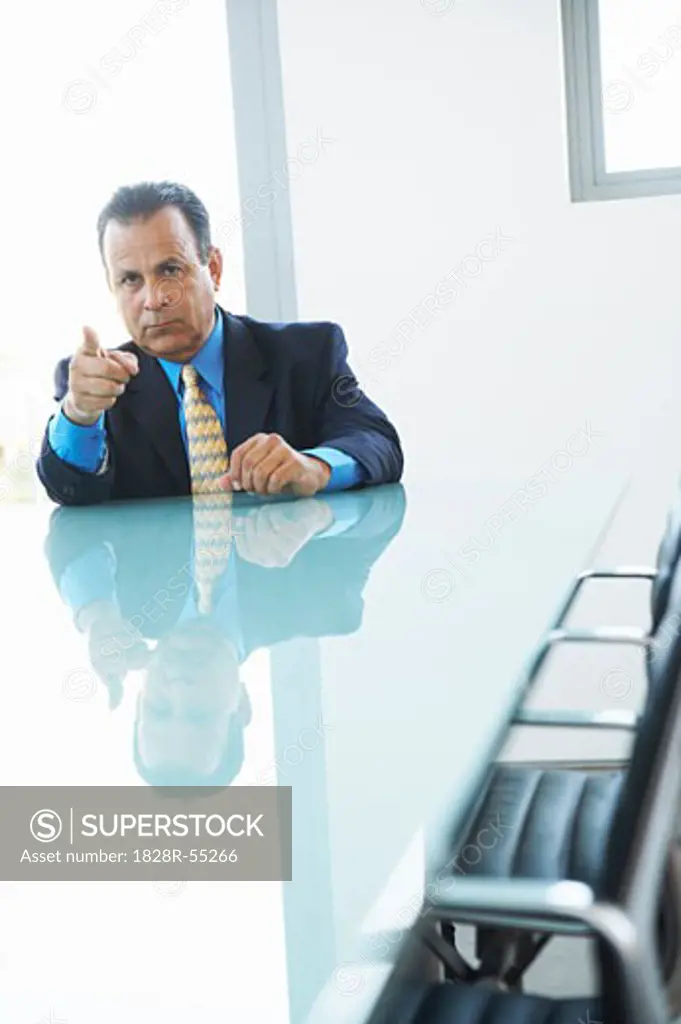 Businessman in Boardroom   