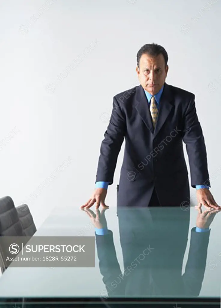 Businessman in Boardroom   