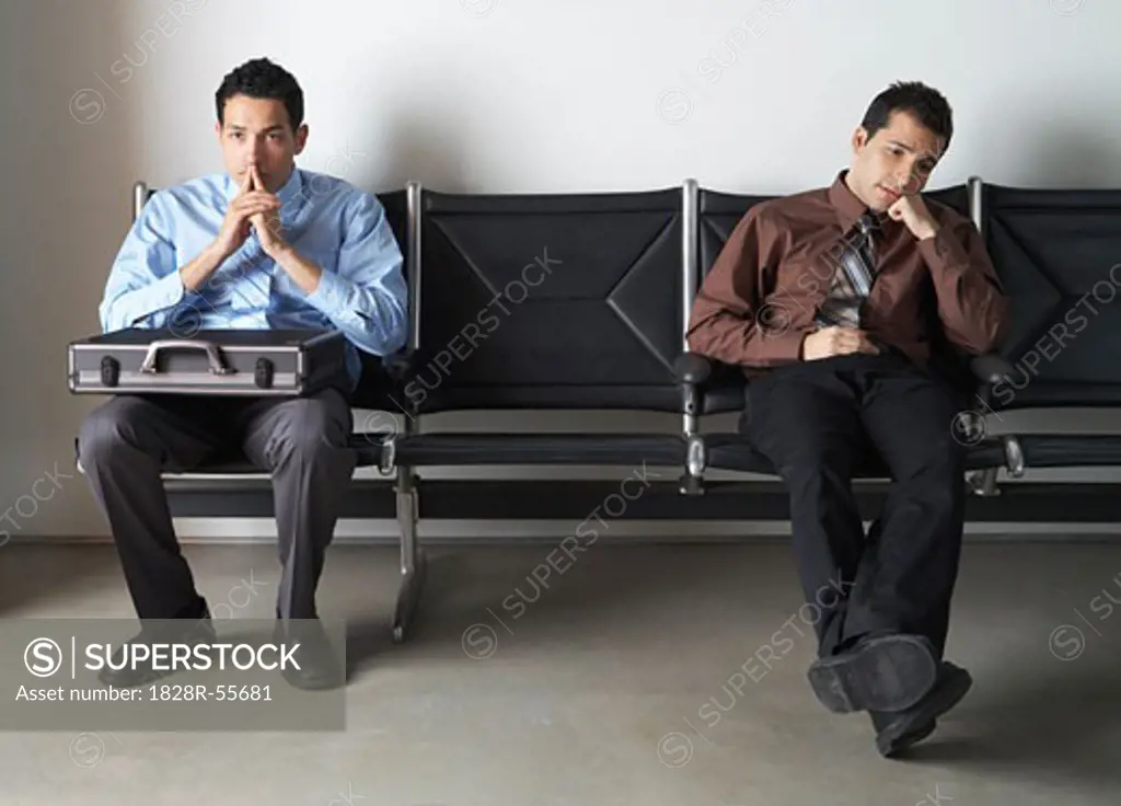 Businessmen in Waiting Area   