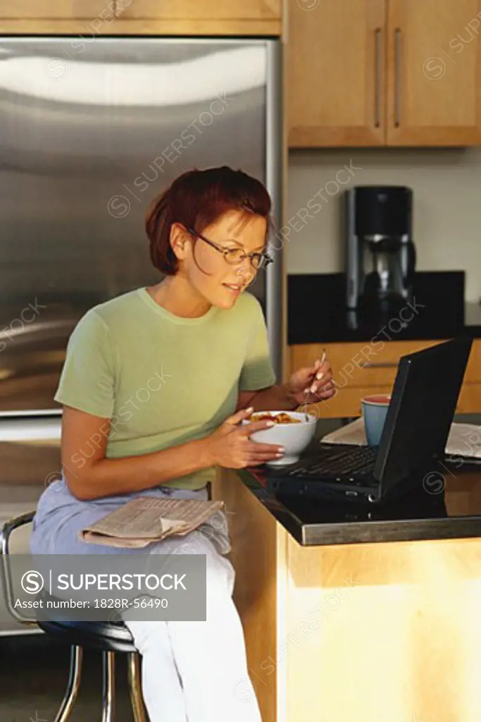 Woman Using Laptop Computer   
