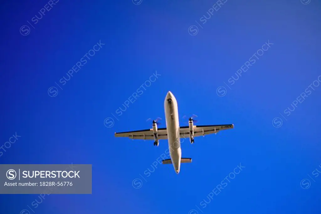 Airplane in Flight, Calgary, Alberta, Canada   
