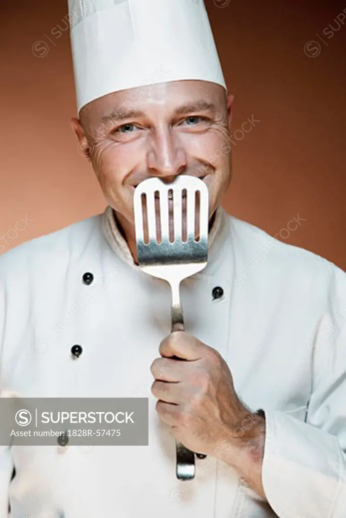 Portrait of Chef Holding Spatula   