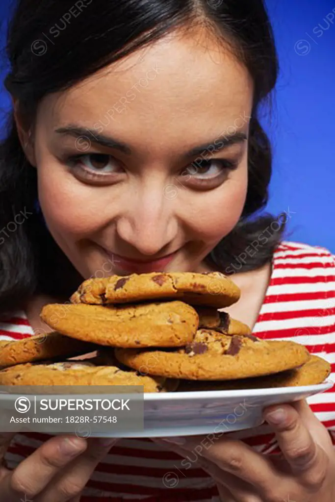 Woman Holding Plate of Cookies   